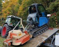 Raupen-Mechanisierungs-System wird abgeladen